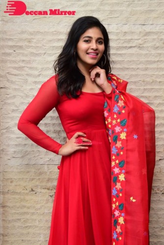Tamil and Telugu Actress Anjali looks cute as she poses for pictures in a Red Salwar Kameez