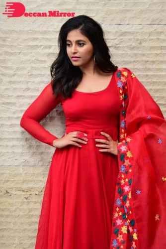 Tamil and Telugu Actress Anjali looks cute as she poses for pictures in a Red Salwar Kameez