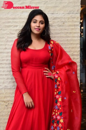 Tamil and Telugu Actress Anjali looks cute as she poses for pictures in a Red Salwar Kameez