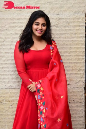 Tamil and Telugu Actress Anjali looks cute as she poses for pictures in a Red Salwar Kameez