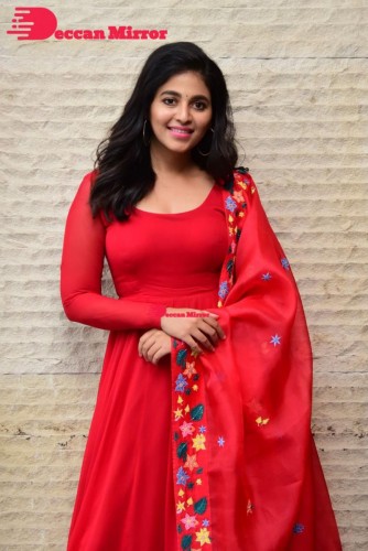 Tamil and Telugu Actress Anjali looks cute as she poses for pictures in a Red Salwar Kameez