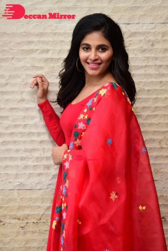 Tamil and Telugu Actress Anjali looks cute as she poses for pictures in a Red Salwar Kameez