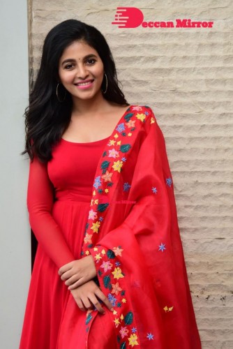 Tamil and Telugu Actress Anjali looks cute as she poses for pictures in a Red Salwar Kameez