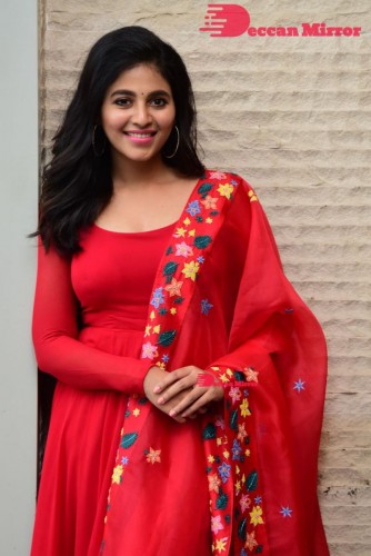 Tamil and Telugu Actress Anjali looks cute as she poses for pictures in a Red Salwar Kameez