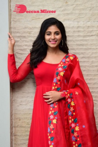 Tamil and Telugu Actress Anjali looks cute as she poses for pictures in a Red Salwar Kameez
