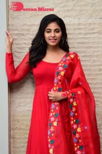 Tamil and Telugu Actress Anjali looks cute as she poses for pictures in a Red Salwar Kameez