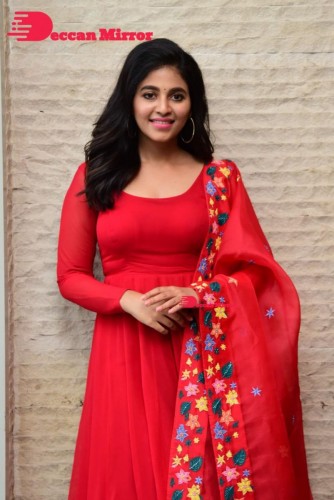 Tamil and Telugu Actress Anjali looks cute as she poses for pictures in a Red Salwar Kameez