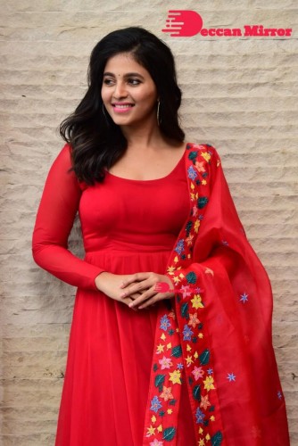 Tamil and Telugu Actress Anjali looks cute as she poses for pictures in a Red Salwar Kameez