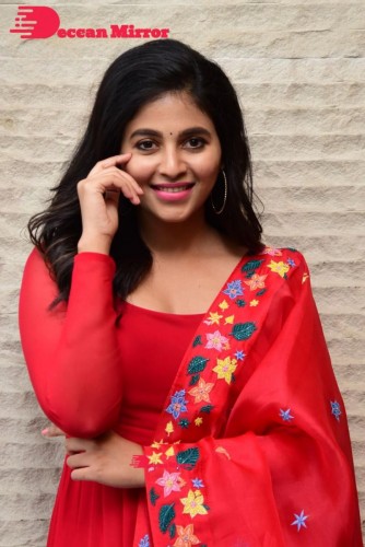 Tamil and Telugu Actress Anjali looks cute as she poses for pictures in a Red Salwar Kameez