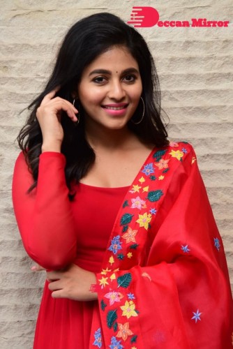 Tamil and Telugu Actress Anjali looks cute as she poses for pictures in a Red Salwar Kameez