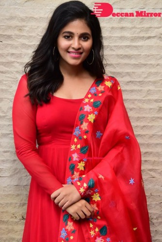 Tamil and Telugu Actress Anjali looks cute as she poses for pictures in a Red Salwar Kameez