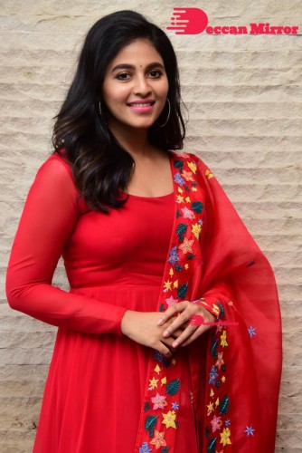 Tamil and Telugu Actress Anjali looks cute as she poses for pictures in a Red Salwar Kameez