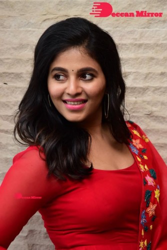Tamil and Telugu Actress Anjali looks cute as she poses for pictures in a Red Salwar Kameez