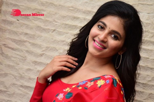 Tamil and Telugu Actress Anjali looks cute as she poses for pictures in a Red Salwar Kameez