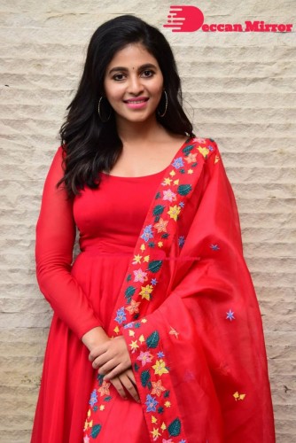 Tamil and Telugu Actress Anjali looks cute as she poses for pictures in a Red Salwar Kameez