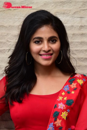 Tamil and Telugu Actress Anjali looks cute as she poses for pictures in a Red Salwar Kameez