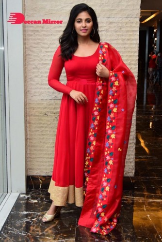 Tamil and Telugu Actress Anjali looks cute as she poses for pictures in a Red Salwar Kameez