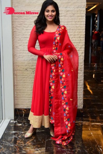 Tamil and Telugu Actress Anjali looks cute as she poses for pictures in a Red Salwar Kameez