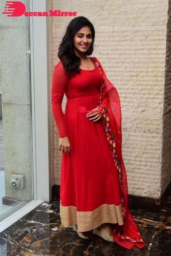 Tamil and Telugu Actress Anjali looks cute as she poses for pictures in a Red Salwar Kameez