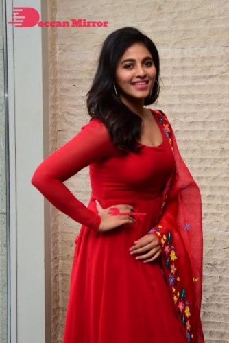Tamil and Telugu Actress Anjali looks cute as she poses for pictures in a Red Salwar Kameez