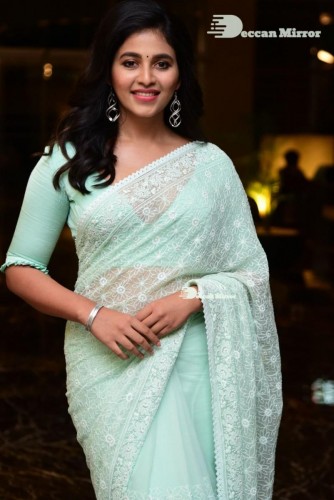 Telugu heroine Anjali in a light green saree