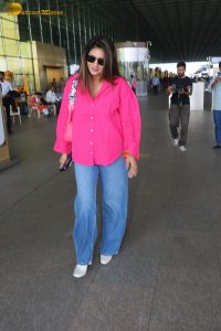 Indian actress and social media influencer anjali arora cute in a pink shirt and denim jeans