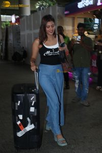 actress Anjali Arora cute in a black top at airport