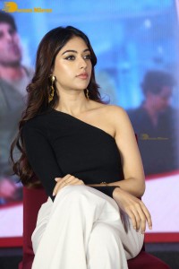 Actress Anu Emmanuel in a black top attending a movie function
