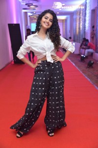 Anupama Parameswaran dressed in black and white