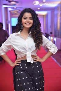 Anupama Parameswaran dressed in black and white