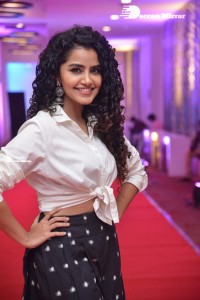 Anupama Parameswaran dressed in black and white