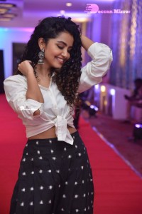 Anupama Parameswaran dressed in black and white