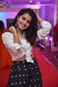 Anupama Parameswaran dressed in black and white