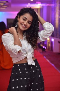 Anupama Parameswaran dressed in black and white