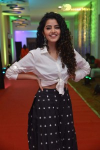 Anupama Parameswaran dressed in black and white