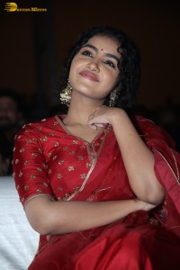 Actress Anupama Parameswaran in a red lehenga choli at a function