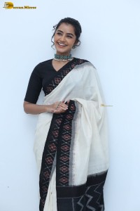 Anupama Parameswaran in a black and white saree