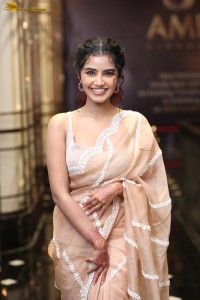 actress Anupama Parameswaran beautiful in a light orange saree