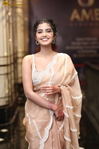 actress Anupama Parameswaran beautiful in a light orange saree