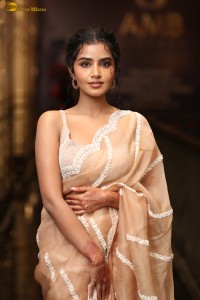 actress Anupama Parameswaran beautiful in a light orange saree