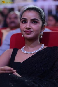 actress Anupama Parameswaran cute in a black saree at a movie function