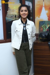 Actress Anupama Parameswaran in khaki pants and white jacket