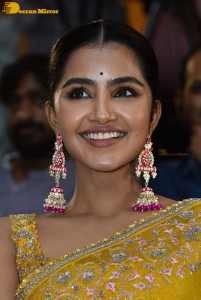 Actress Anupama Parameswaran in a yellow saree