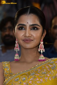 Actress Anupama Parameswaran in a yellow saree