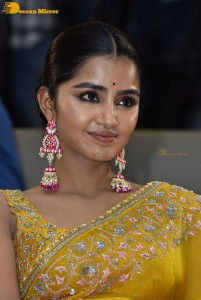 Actress Anupama Parameswaran in a yellow saree