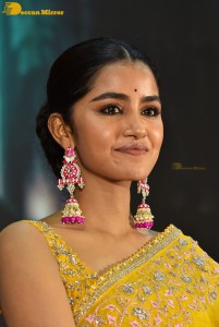 Actress Anupama Parameswaran in a yellow saree