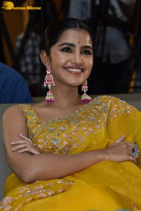 Actress Anupama Parameswaran in a yellow saree
