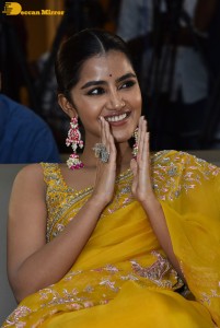 Actress Anupama Parameswaran in a yellow saree