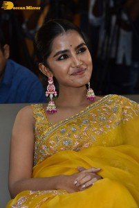 Actress Anupama Parameswaran in a yellow saree