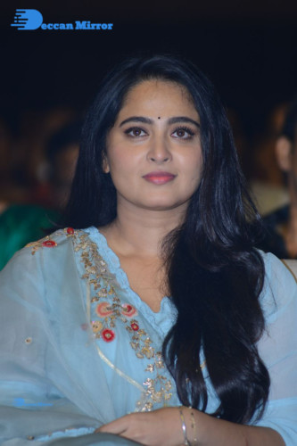 Telugu Actress Anushka Shetty in a blue dress attending a movie event